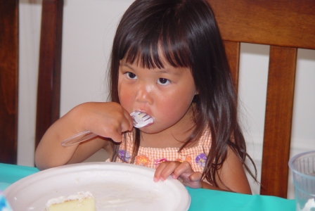 Kasen enjoying cake and ice cream